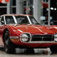 Illustration for article titled Hey, Let's Rob Some Banks To Buy This Perfect Left-Hand-Drive Toyota 2000GT